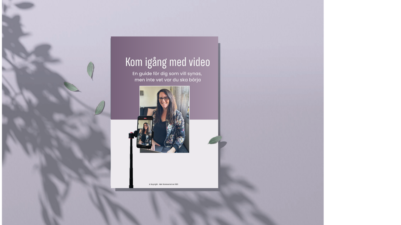 Ett bord med en ipad som visar en framsida på en pdf 